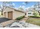 Charming single-story home with a two-car garage and well-maintained landscaping at 13205 Cypress Hill Dr, Hudson, FL 34669