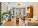 Inviting living room with hardwood floors, lots of natural light, and comfortable seating at 13205 Cypress Hill Dr, Hudson, FL 34669