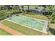 Aerial view of shuffleboard court with parking and green space at 13205 Cypress Hill Dr, Hudson, FL 34669