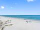 Expansive beach featuring crystal-clear water and pristine white sand at 13500 Gulf Blvd # 706, Madeira Beach, FL 33708