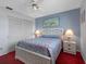 Bedroom showcases queen bed and closet at 13500 Gulf Blvd # 706, Madeira Beach, FL 33708