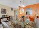 The dining area features seating for six and a pass through to the kitchen at 13500 Gulf Blvd # 706, Madeira Beach, FL 33708