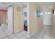 Hallway leading to bathroom and bedroom at 13500 Gulf Blvd # 706, Madeira Beach, FL 33708