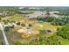 Aerial shot of the baseball fields, showing expansive green space and community recreational area at 13727 Whiskey Daisy Dr, Dade City, FL 33525