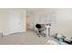 Versatile bedroom space featuring a dedicated work area and ample room for personalization and comfort at 13727 Whiskey Daisy Dr, Dade City, FL 33525