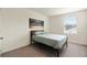 Comfortable bedroom featuring ample natural light, a comfortable bed, and a serene atmosphere at 13727 Whiskey Daisy Dr, Dade City, FL 33525