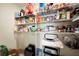 Walk-in pantry offering ample storage space with wire shelving fully stocked with groceries and other essentials at 13727 Whiskey Daisy Dr, Dade City, FL 33525