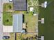 Waterfront home with serene water views, a cozy outdoor seating area, and private dock access at 13920 Berkowitz Ave, Hudson, FL 34667