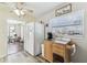 Charming kitchen with stainless steel appliances, a wooden island, and abundant natural light at 13920 Berkowitz Ave, Hudson, FL 34667