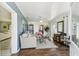 Cozy living room features stylish furnishings, wood-look floors, and bright natural light, creating an inviting atmosphere at 13920 Berkowitz Ave, Hudson, FL 34667