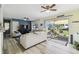 Spacious living room with a large sliding glass door leading to the outdoor area at 13920 Berkowitz Ave, Hudson, FL 34667
