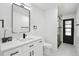 Modern bathroom boasts a stylish vanity with black hardware and a frameless glass shower at 14170 Fennsbury Dr, Tampa, FL 33624