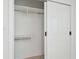 Walk-in closet with custom shelving and ample storage space provides organization at 14170 Fennsbury Dr, Tampa, FL 33624