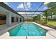 Outdoor screened-in pool area, providing a relaxing and private space for recreation and leisure at 14170 Fennsbury Dr, Tampa, FL 33624