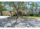 Charming two-story home with a welcoming entrance, well-manicured landscaping, and a spacious three-car garage at 16170 Colchester Palms Dr, Tampa, FL 33647