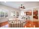 Open-concept living room featuring a large sectional sofa and seamless transition to the kitchen at 16170 Colchester Palms Dr, Tampa, FL 33647