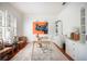 Spacious office with an elephant art piece, white furniture, a large window, and bright, natural light at 16170 Colchester Palms Dr, Tampa, FL 33647