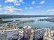 Stunning aerial view of condo buildings nestled near a scenic bay and residential area at 17920 Gulf Blvd # 208, Redington Shores, FL 33708