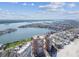 Wide aerial view of a stunning bay and residences at 17920 Gulf Blvd # 208, Redington Shores, FL 33708