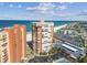 Aerial view of the condo community and surrounding area by the ocean at 17920 Gulf Blvd # 208, Redington Shores, FL 33708