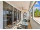A lovely balcony space with seating, decorated with charming nautical decor at 17920 Gulf Blvd # 208, Redington Shores, FL 33708