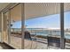 Enjoy ocean views from this balcony, complete with seating overlooking the pool and beach at 17920 Gulf Blvd # 208, Redington Shores, FL 33708