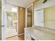 Bathroom boasts a vanity area, closet, and a walk-in shower with glass doors, offering a spa-like experience at 17920 Gulf Blvd # 208, Redington Shores, FL 33708