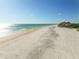 Expansive sandy beach perfect for sunbathing and relaxing by the ocean at 17920 Gulf Blvd # 208, Redington Shores, FL 33708