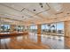 Spacious event space with polished hardwood floors, beachfront views, and a stage at 17920 Gulf Blvd # 208, Redington Shores, FL 33708