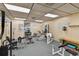 A complete fitness center with weight machines, dumbbells, and exercise equipment at 17920 Gulf Blvd # 208, Redington Shores, FL 33708