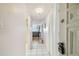 Inviting condo hallway leading into the condo at 17920 Gulf Blvd # 208, Redington Shores, FL 33708