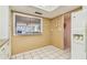 Bright kitchen featuring a pass-through to a dining room and white appliances at 17920 Gulf Blvd # 208, Redington Shores, FL 33708