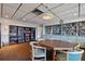 Spacious library with extensive bookshelves, a cozy atmosphere, and comfortable seating at 17920 Gulf Blvd # 208, Redington Shores, FL 33708