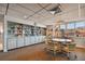 Community library with floor-to-ceiling bookshelves, reading nooks, and a cozy atmosphere at 17920 Gulf Blvd # 208, Redington Shores, FL 33708