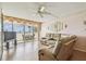 Comfortable living room with balcony access and ocean views at 17920 Gulf Blvd # 208, Redington Shores, FL 33708
