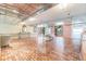 Elegant lobby featuring mirrored walls, stylish furnishings, and a polished brick floor at 17920 Gulf Blvd # 208, Redington Shores, FL 33708