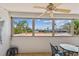 Enjoy beautiful views from this covered patio, complete with a ceiling fan and comfortable seating at 17920 Gulf Blvd # 208, Redington Shores, FL 33708