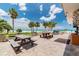 A delightful picnic area with multiple tables and beachfront access, perfect for outdoor gatherings at 17920 Gulf Blvd # 208, Redington Shores, FL 33708