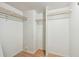 Spacious walk-in closet with multiple wire racks for optimum storage and organization space at 17920 Gulf Blvd # 208, Redington Shores, FL 33708
