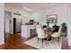 Modern kitchen with barstool seating open to dining area at 18107 Peregrines Perch Pl # 6303, Lutz, FL 33558