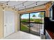 Balcony featuring a sliding glass door and views of the parking lot at 1905 Oyster Catcher Ln # 924, Clearwater, FL 33762
