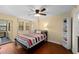 Comfortable bedroom featuring a ceiling fan and bright windows at 1905 Oyster Catcher Ln # 924, Clearwater, FL 33762