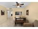Dining area featuring tile flooring, views into kitchen, ceiling fan, and neutral paint at 1905 Oyster Catcher Ln # 924, Clearwater, FL 33762