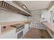 Outdoor kitchen space with stainless steel grill and concrete countertops, perfect for entertaining at 1905 Oyster Catcher Ln # 924, Clearwater, FL 33762