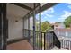 Screened-in porch with views of the community and surrounding greenery at 1905 Oyster Catcher Ln # 924, Clearwater, FL 33762