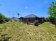 Enjoyable backyard with a screened lanai that is perfect for outdoor entertaining at 20295 Lorenzo Ave, Port Charlotte, FL 33952