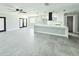 Bright and spacious living room featuring an open-concept layout with modern finishes at 20295 Lorenzo Ave, Port Charlotte, FL 33952