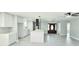 Open floor plan featuring a modern kitchen, a dining area, and a living area at 20295 Lorenzo Ave, Port Charlotte, FL 33952