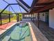 Enclosed pool with brick pavers, pool has star emblem at the bottom at 20295 Lorenzo Ave, Port Charlotte, FL 33952