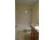 Standard bathroom with single vanity, toilet, and shower-tub combo to offer essential fixtures at 20420 Carolina Cherry Ct, Tampa, FL 33647